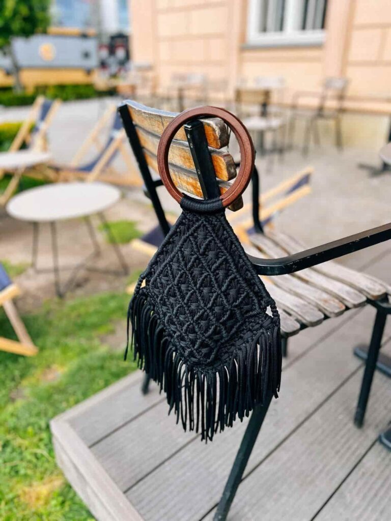 black macrame bag with wooden hand handle toristale